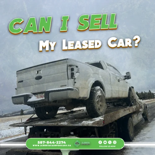 Heavy-duty tow truck hauling a dirty, damaged silver Ford pickup on a snowy road; green text asks: "CAN I SELL MY LEASED CAR?" Contact info below.