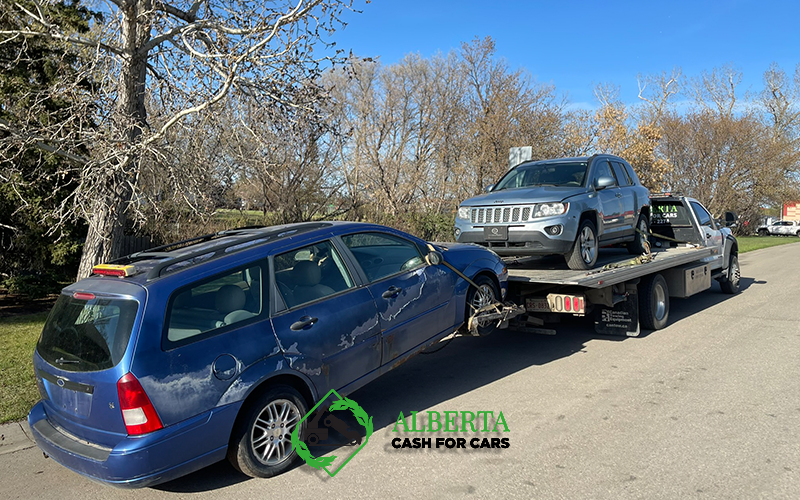 A car being towed by a tow truck