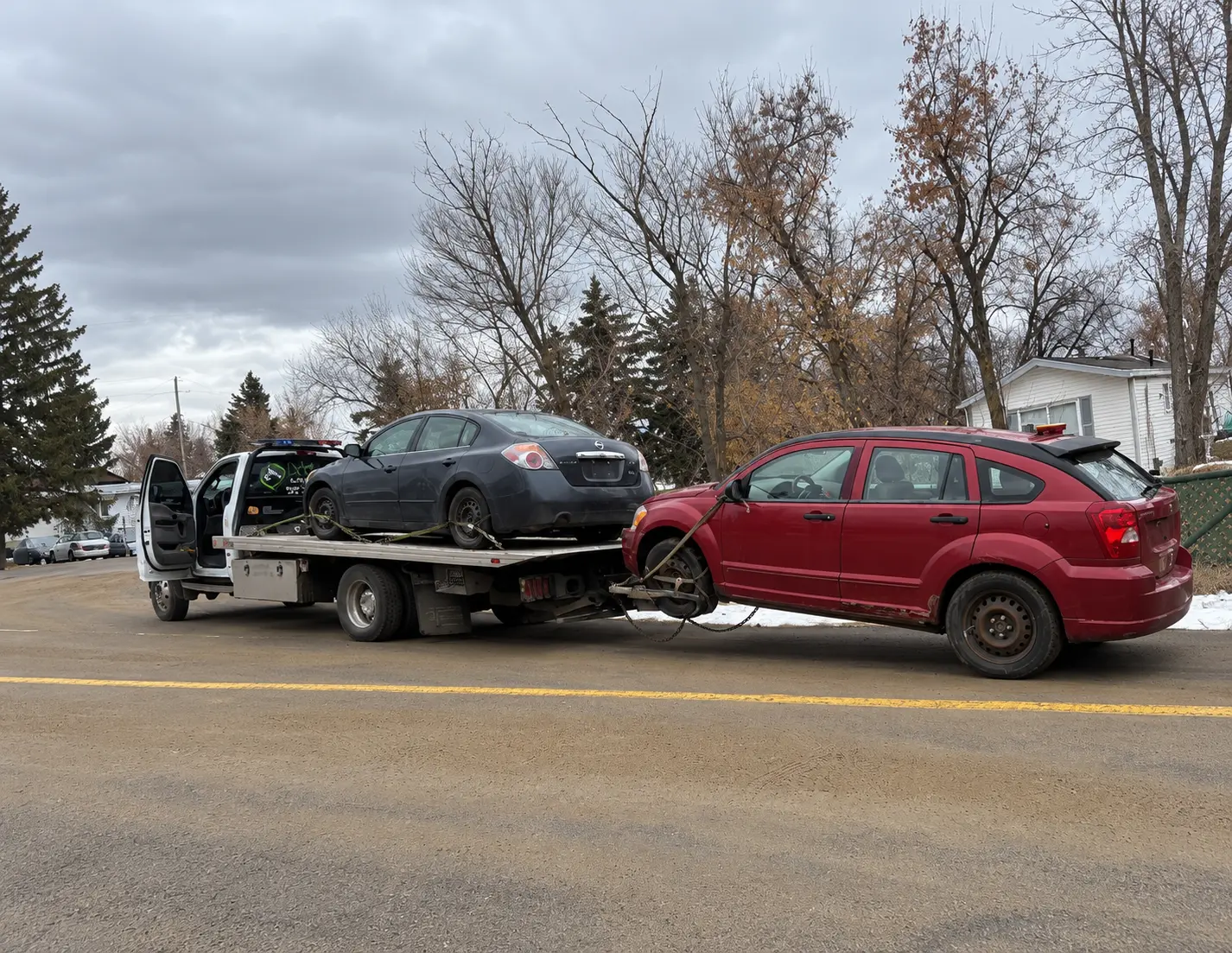Vehicle collected for cash with free towing near Diamond Valley, Alberta